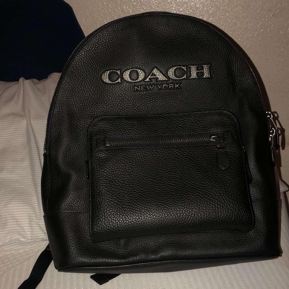 A black coach men’s backpack